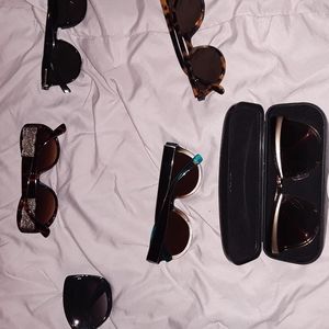 A Few Pairs Of Sunglasses. Prada Panama Jack Lane Bryant & others.& a free gift
